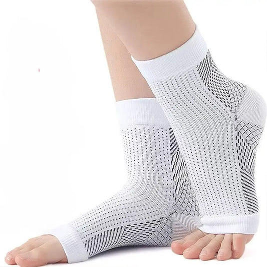 Ankelstøtte med kompression til løb