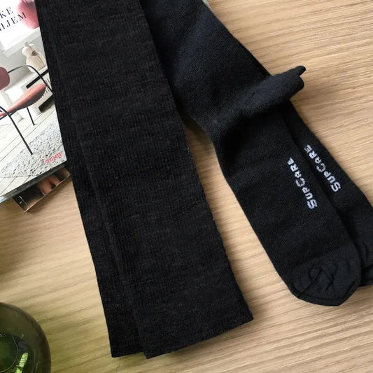 Ensfarvede sorte støttestrømper, uld